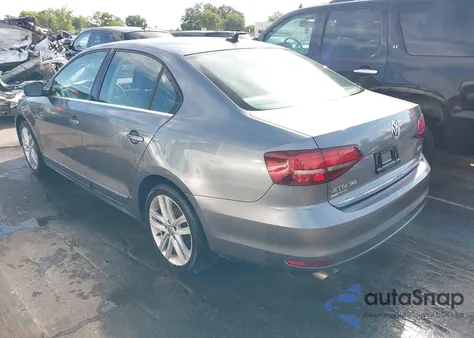 2017 Volkswagen Jetta Sel/Sel Premium z USA, uszkodzony, nr VIN 3VWL17AJ9HM391486